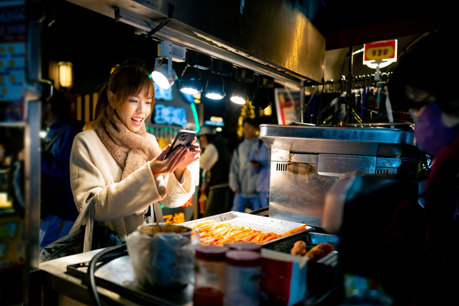 Food Photography in SG: Traditional market stall with a shopper making a purchase